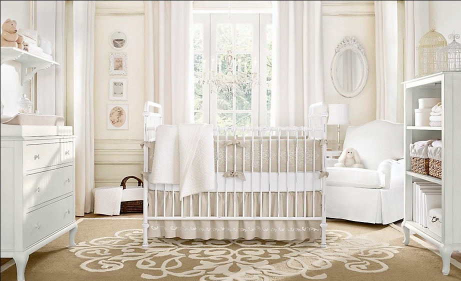 Elegant neutral nursery with white cot and soft furnishings