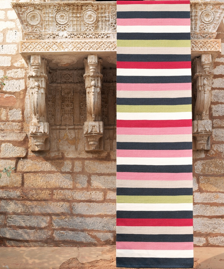 Colourful striped runner rug in pink navy and green