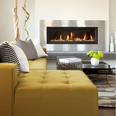 Modern living room with linear fireplace and mustard sofa