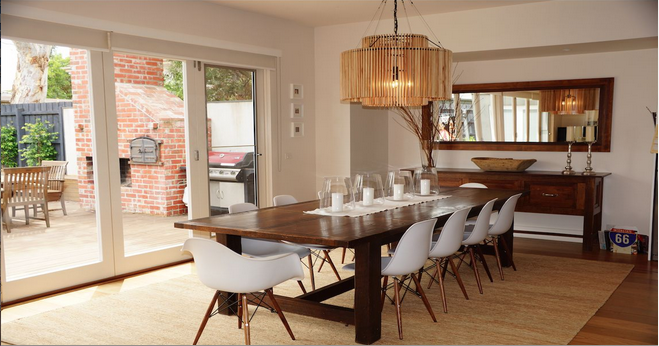 Contemporary Dining Room with Timber Pendant Light and Eames Chairs
