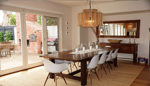 Contemporary dining room with timber table and pendant light