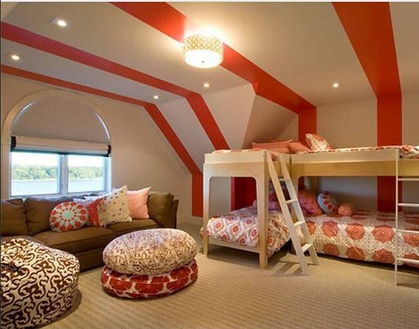 Fun kids bedroom with bunk beds and bold orange stripes