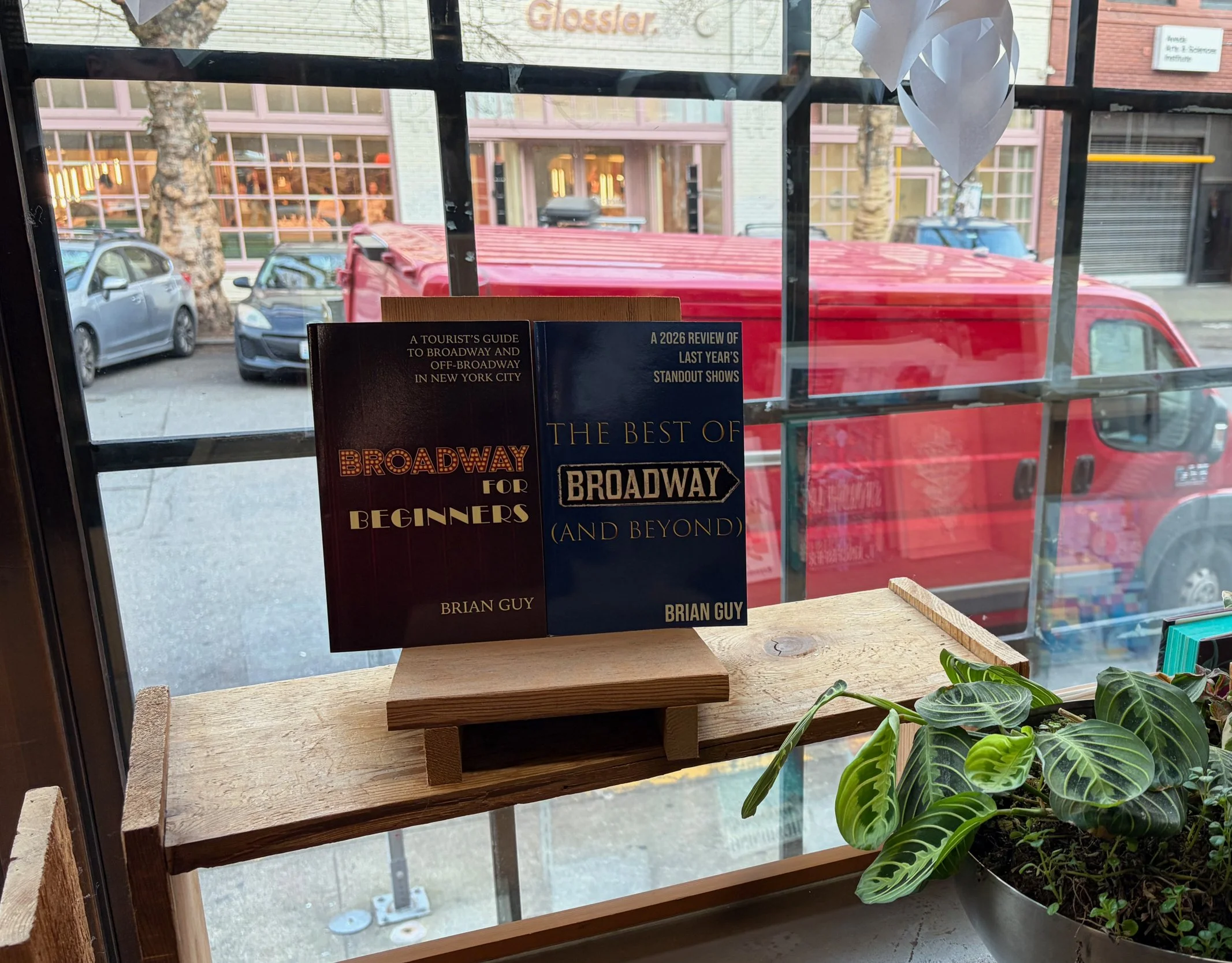 Photo of books on a shelf in a bookstore
