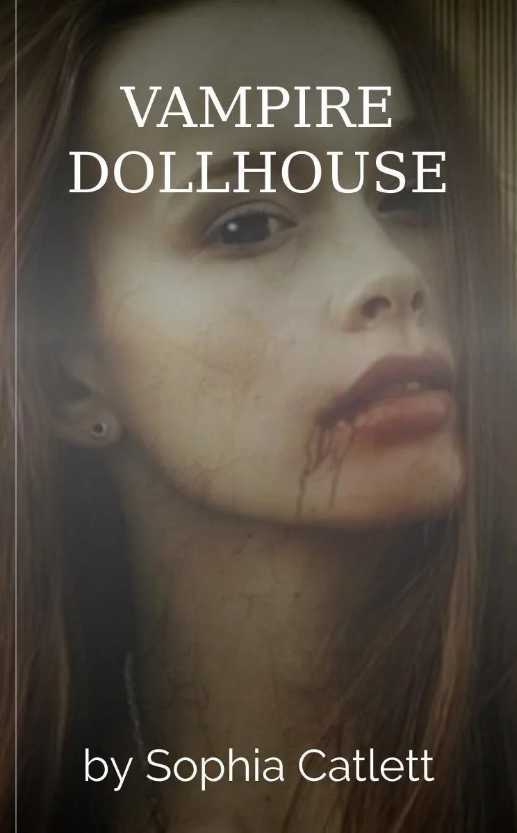 Book cover titled "Vampire Dollhouse" with a close-up of a woman with pale skin, long brown hair, dark eye makeup, and blood dripping from her lip.