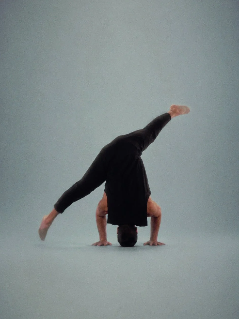 Chris Magee Yoga Teacher in Headstand Balance with Split Legs