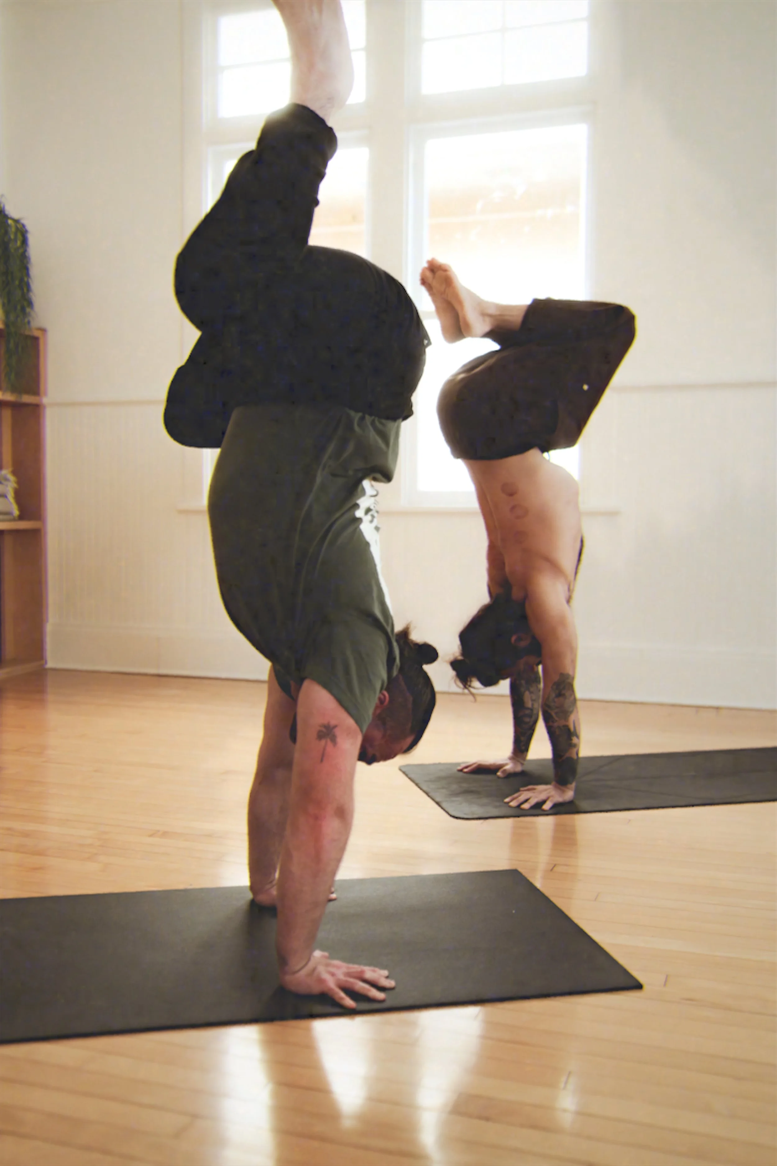 Chris Magee and Patrick Beach Practicing Handstands.