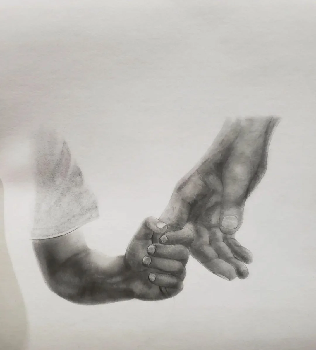 A detailed black and white sketch of a large adult hand gently holding a small child's hand.