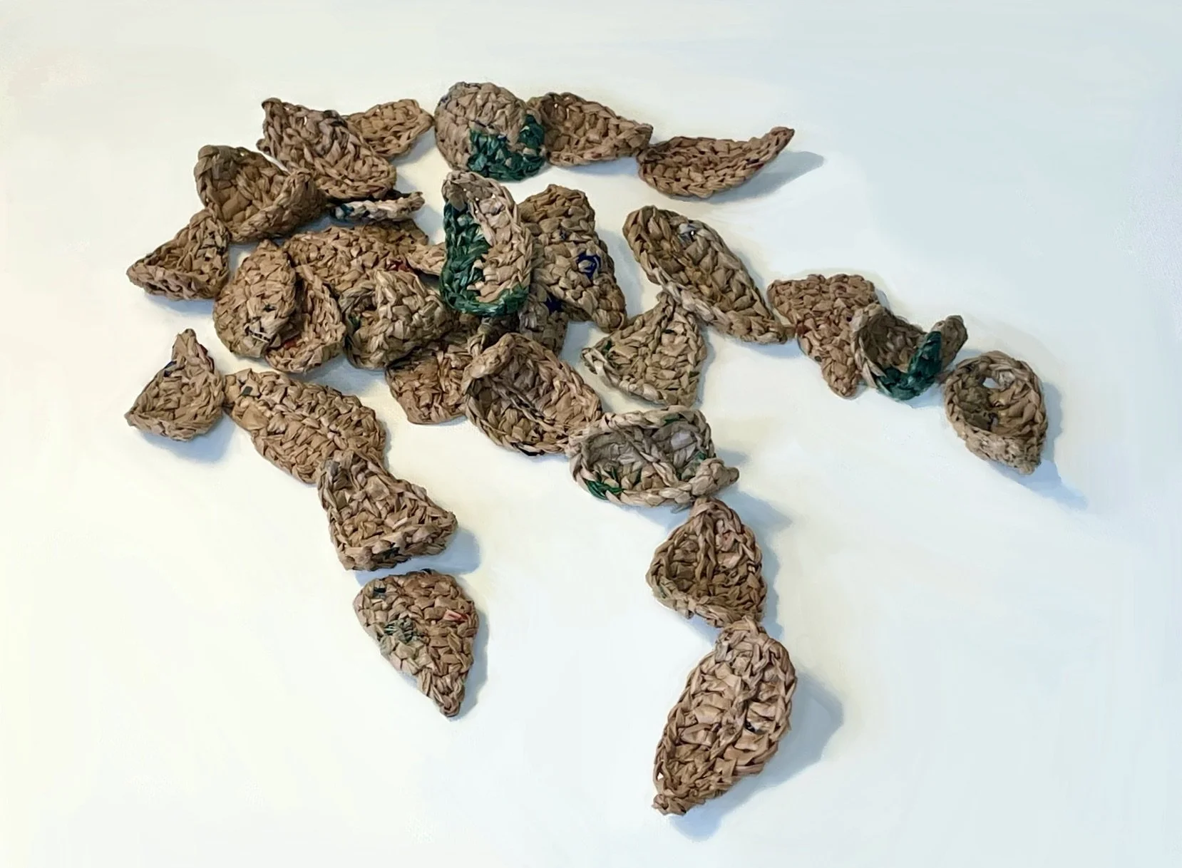 La Femme 100 Têtes (The Hundred Headless Woman), Single-use plastic bags, 14x14in, 2025.