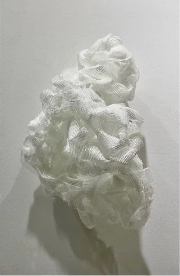 The Void Between Repairs, Scrim tape, 16x12x8in, 2025.