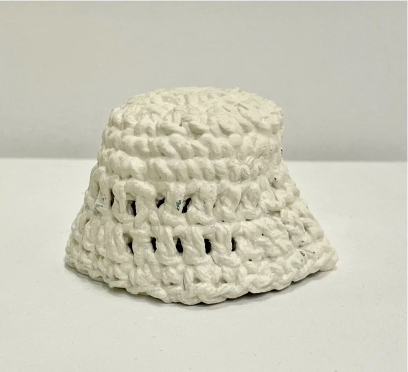 The Memory of Softness, Exposed cotton in porcelain, 2.5x3x4in, 2025.