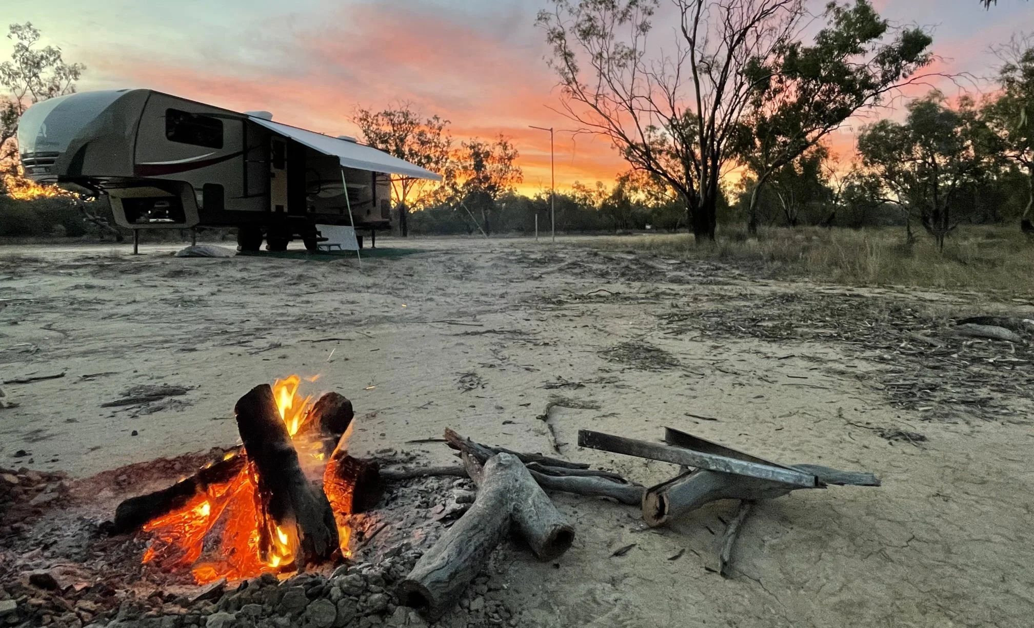 Campfire Tongs at Campfire, Tongs for Tossers at campsite with sunset