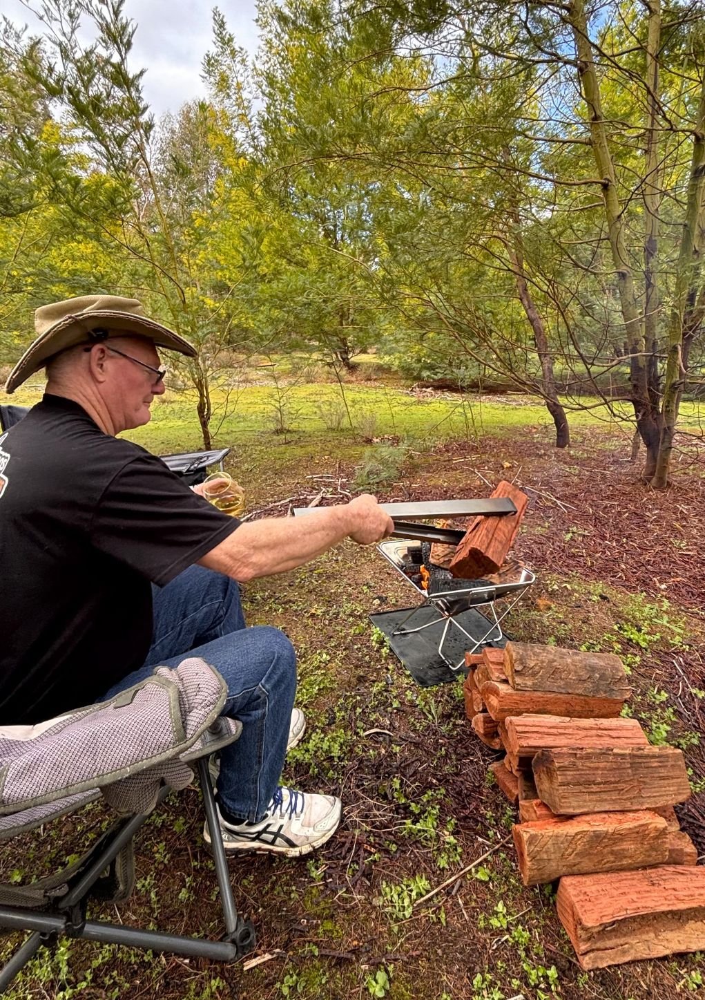 Nice peaceful camp with Tongs for Tossers tending the fire