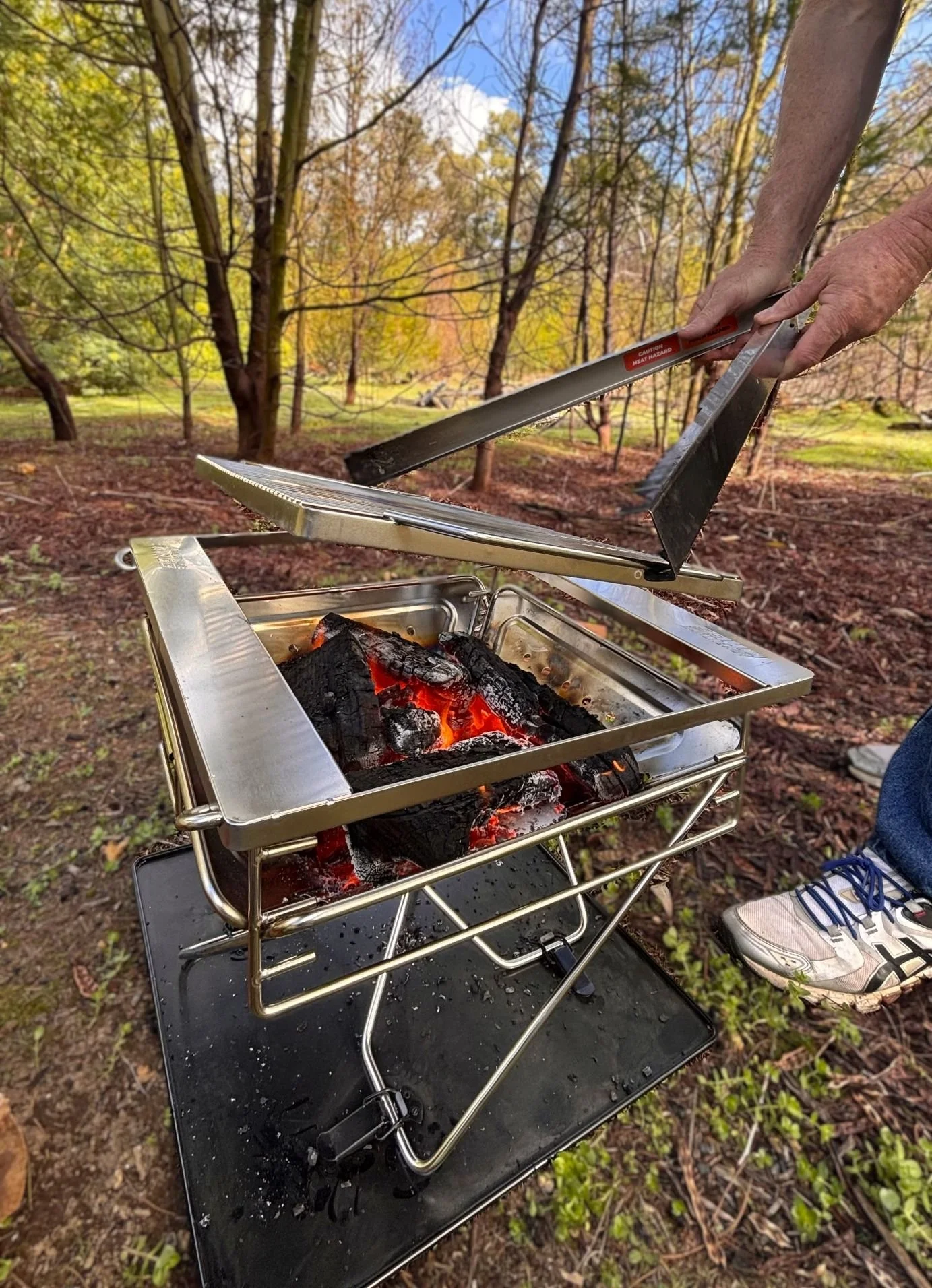 lift that hot fire pit grill with a set of Tongs for Tossers