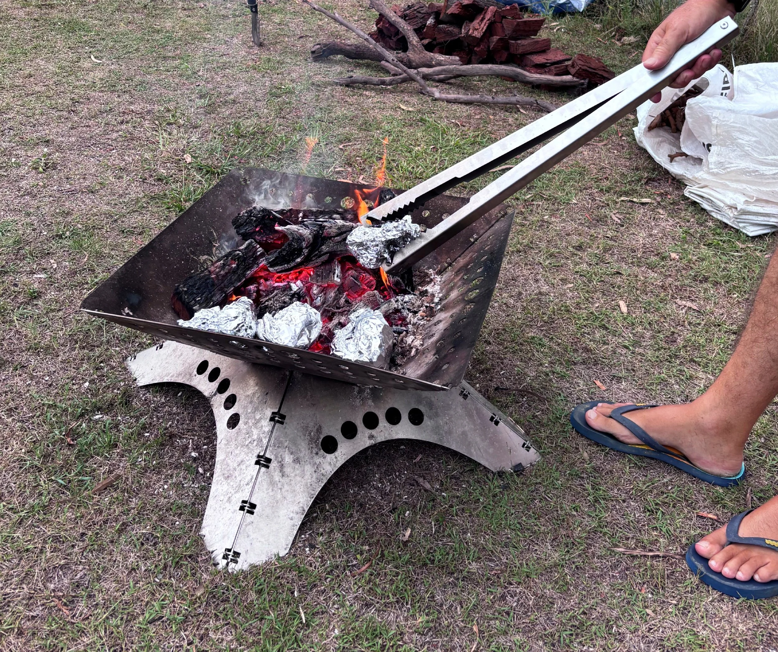 Campfire Photo over Dam when using Tongs for Tossers Campfire Tongs