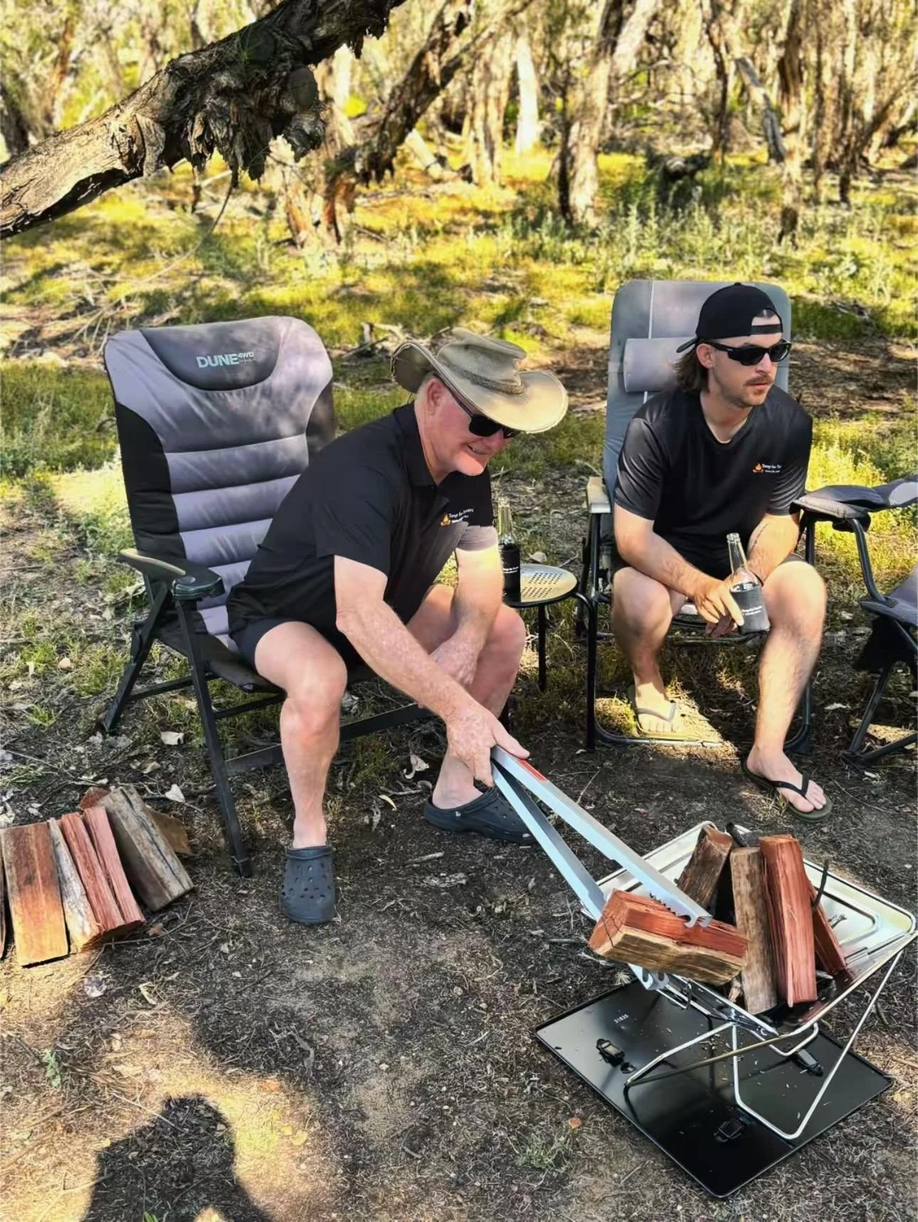 Friends and family camping with Tongs for Tossers Campfire Tongs