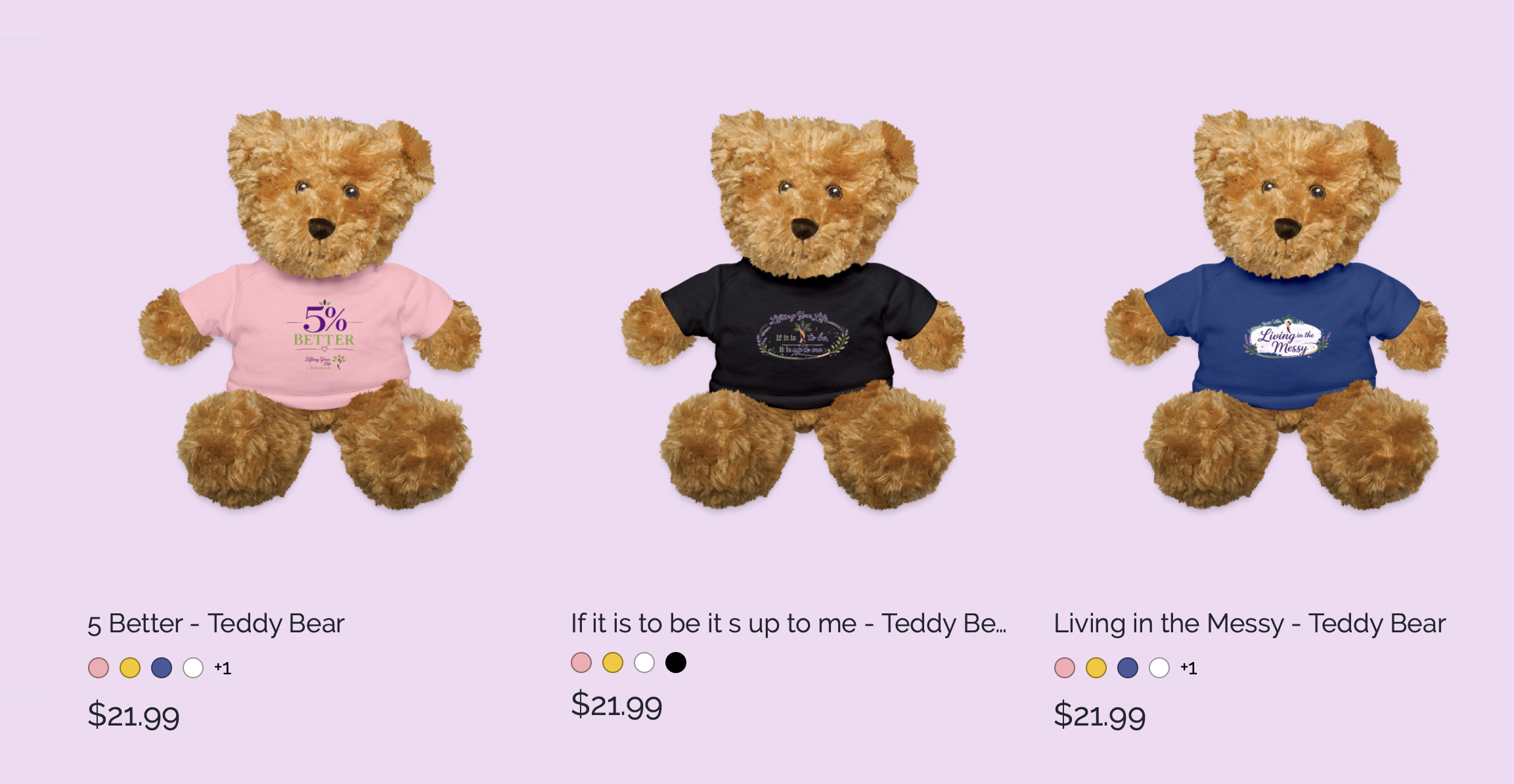 Three teddy bear plush toys dressed in colorful t-shirts with different slogans, set against a light purple background.