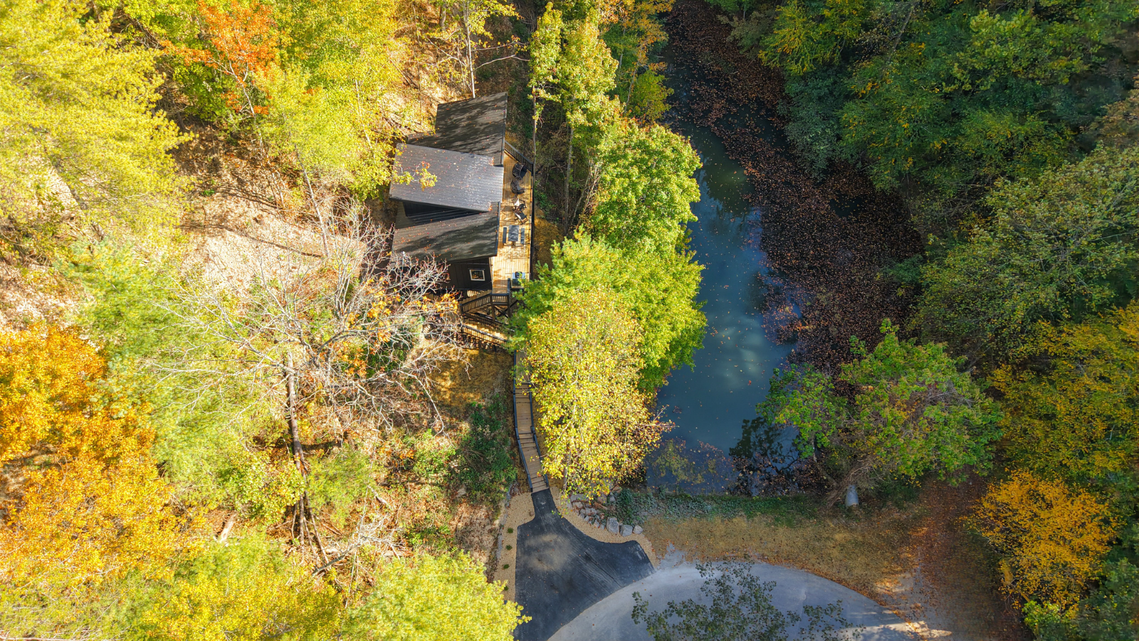 Aerial view of wooded Smoky Mountain property in Tennessee
