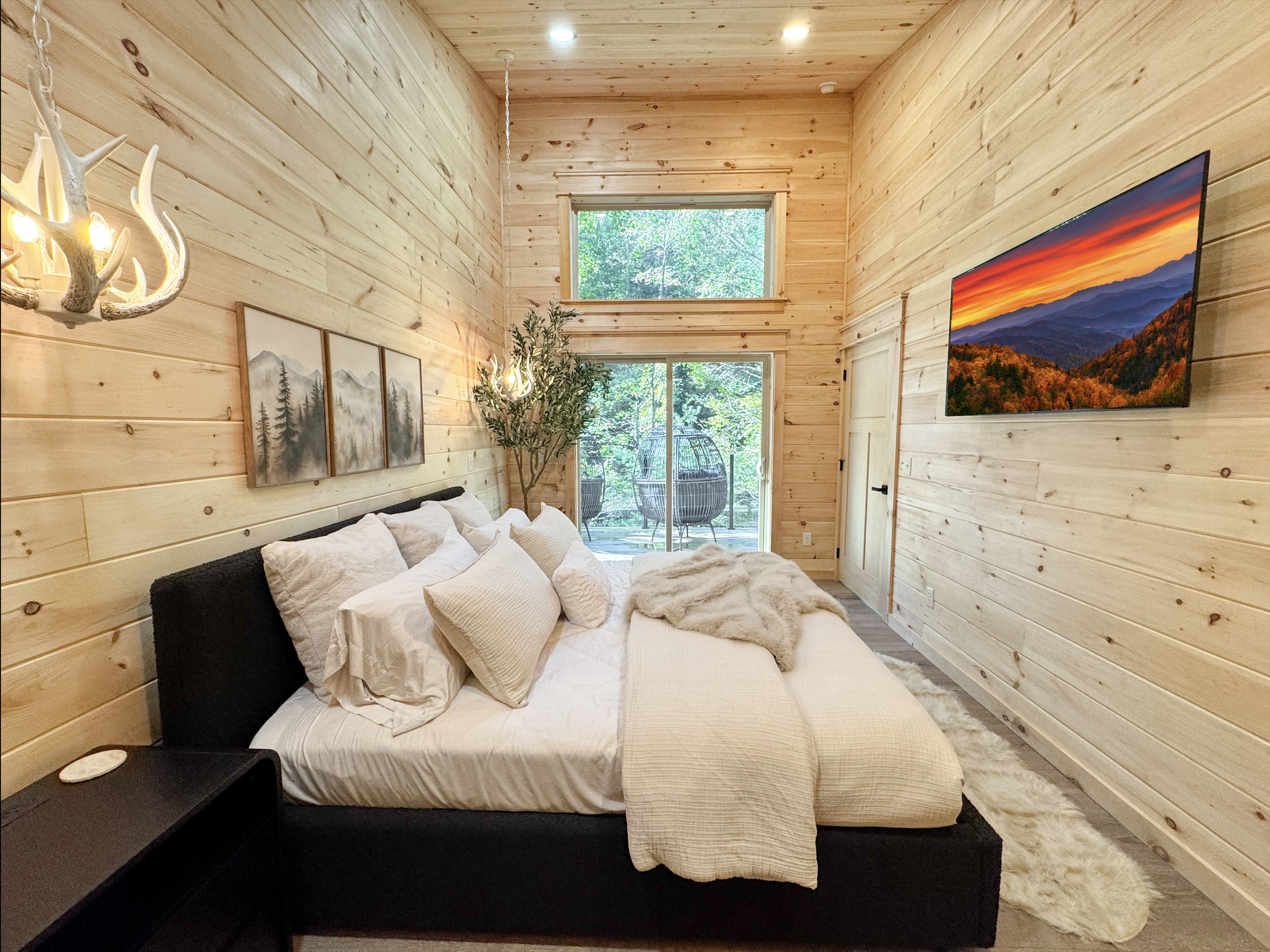 Primary bedroom in a modern Smoky Mountain cabin
