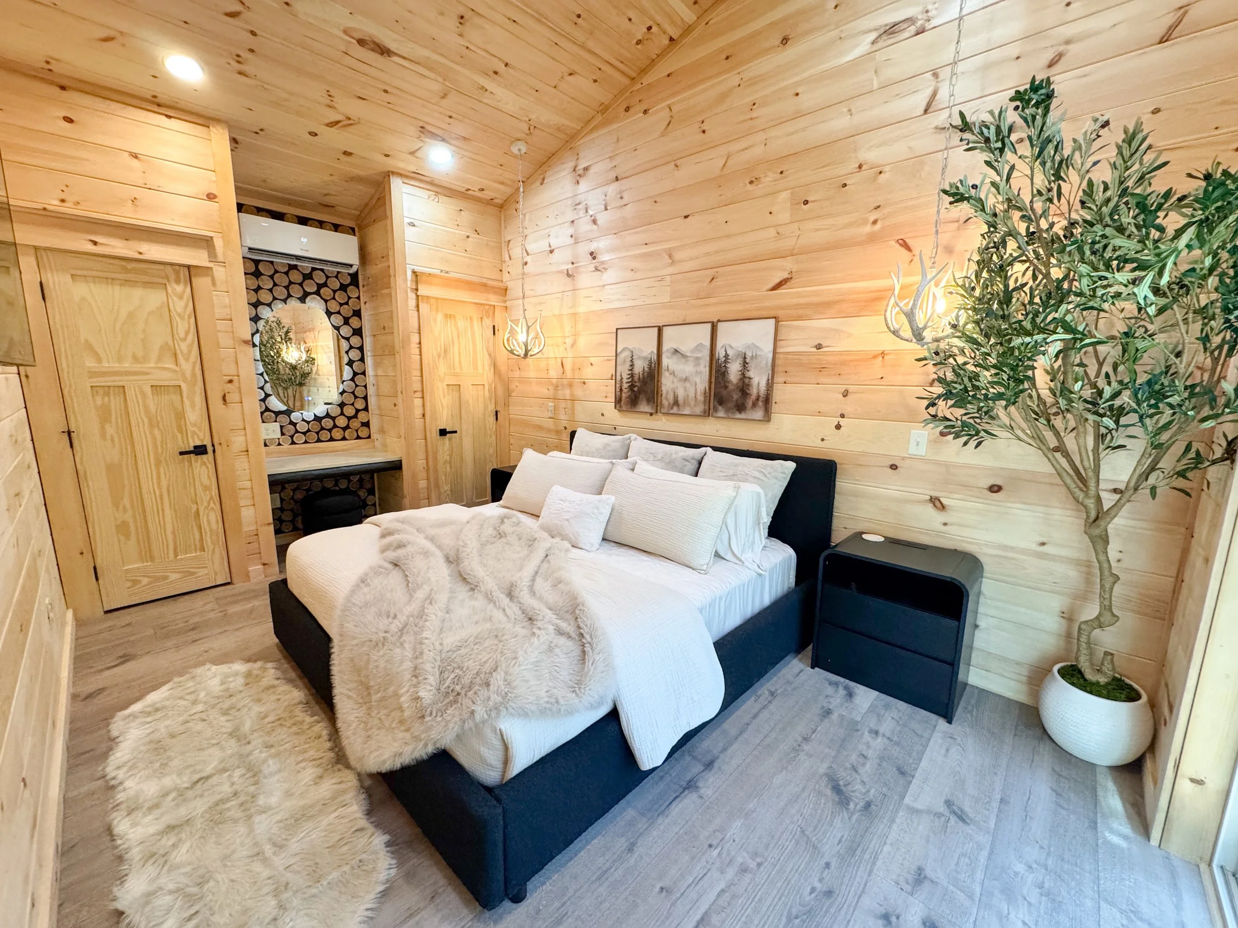 High-end Smoky Mountain vacation home bedroom interior design with curated décor and full-service styling by GSM Agency.