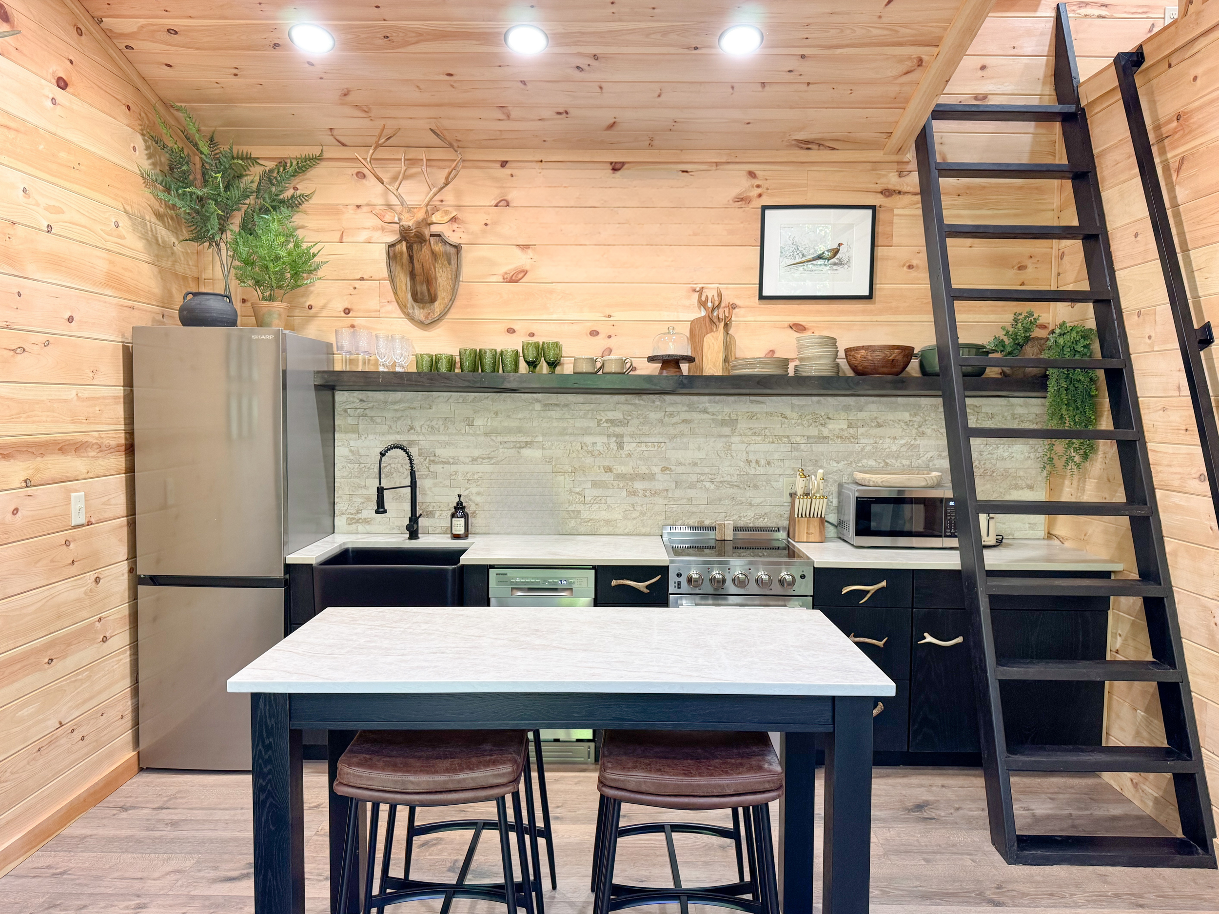 Modern cabin kitchen with wood finishes in Sevierville Tennessee
