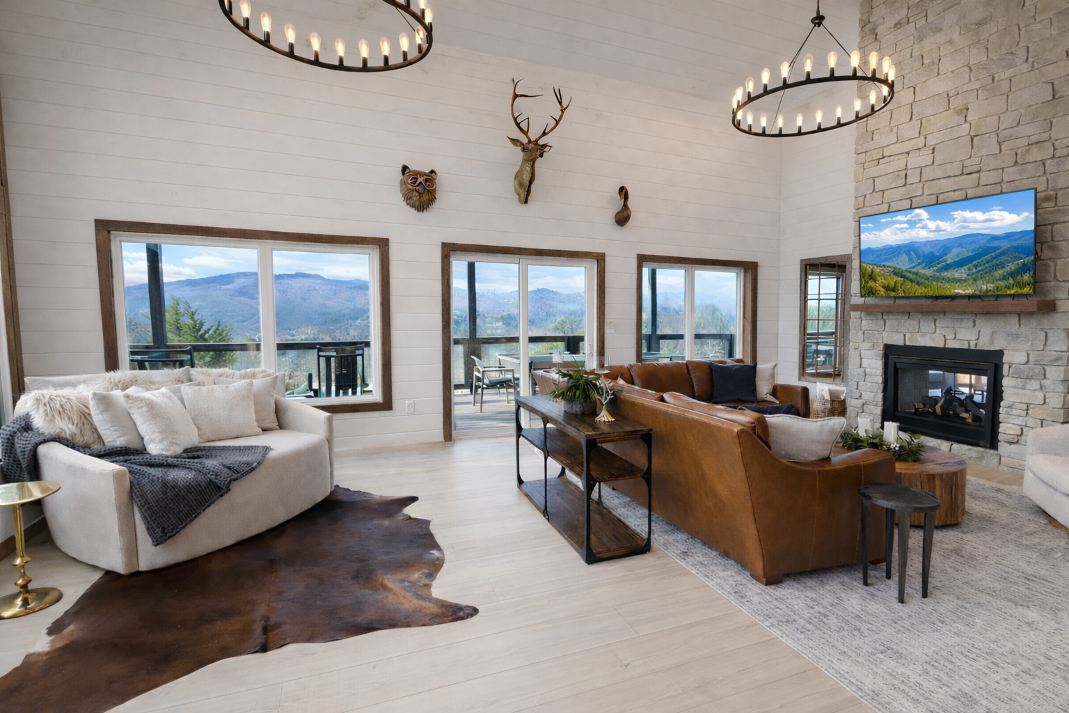 Open concept living area in a modern Smoky Mountain cabin in Gatlinburg Tennessee
