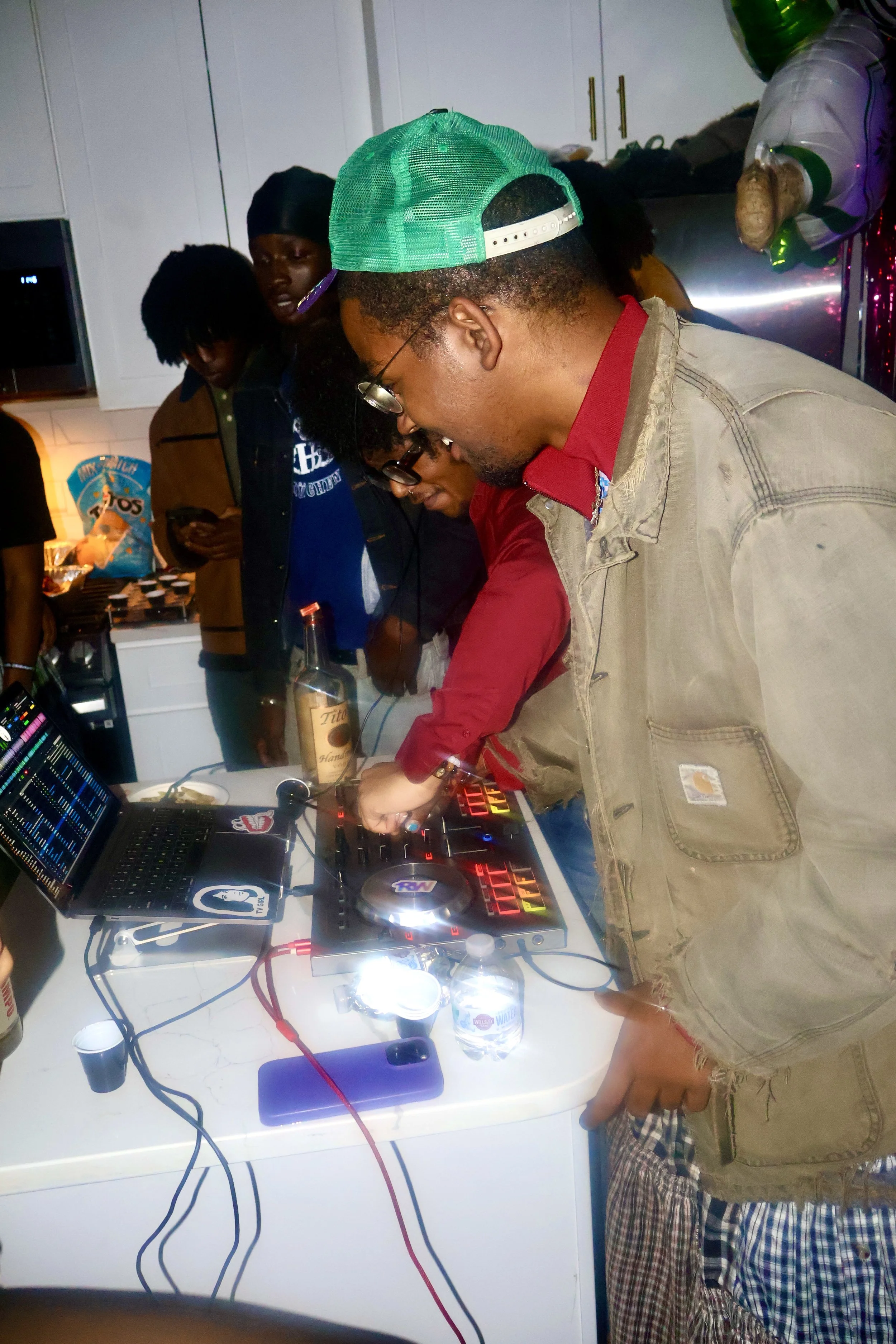 HBCU DJ playing music at House party