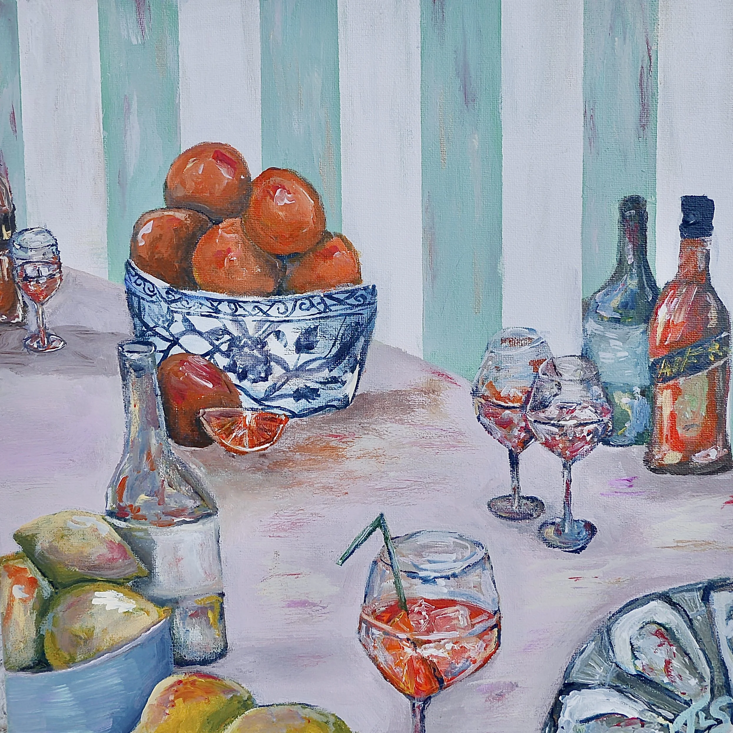 Painting of a table with food and drinks, featuring a bowl of oranges, lemons, wine bottles, glasses of wine, and a glass of orange drink with ice.