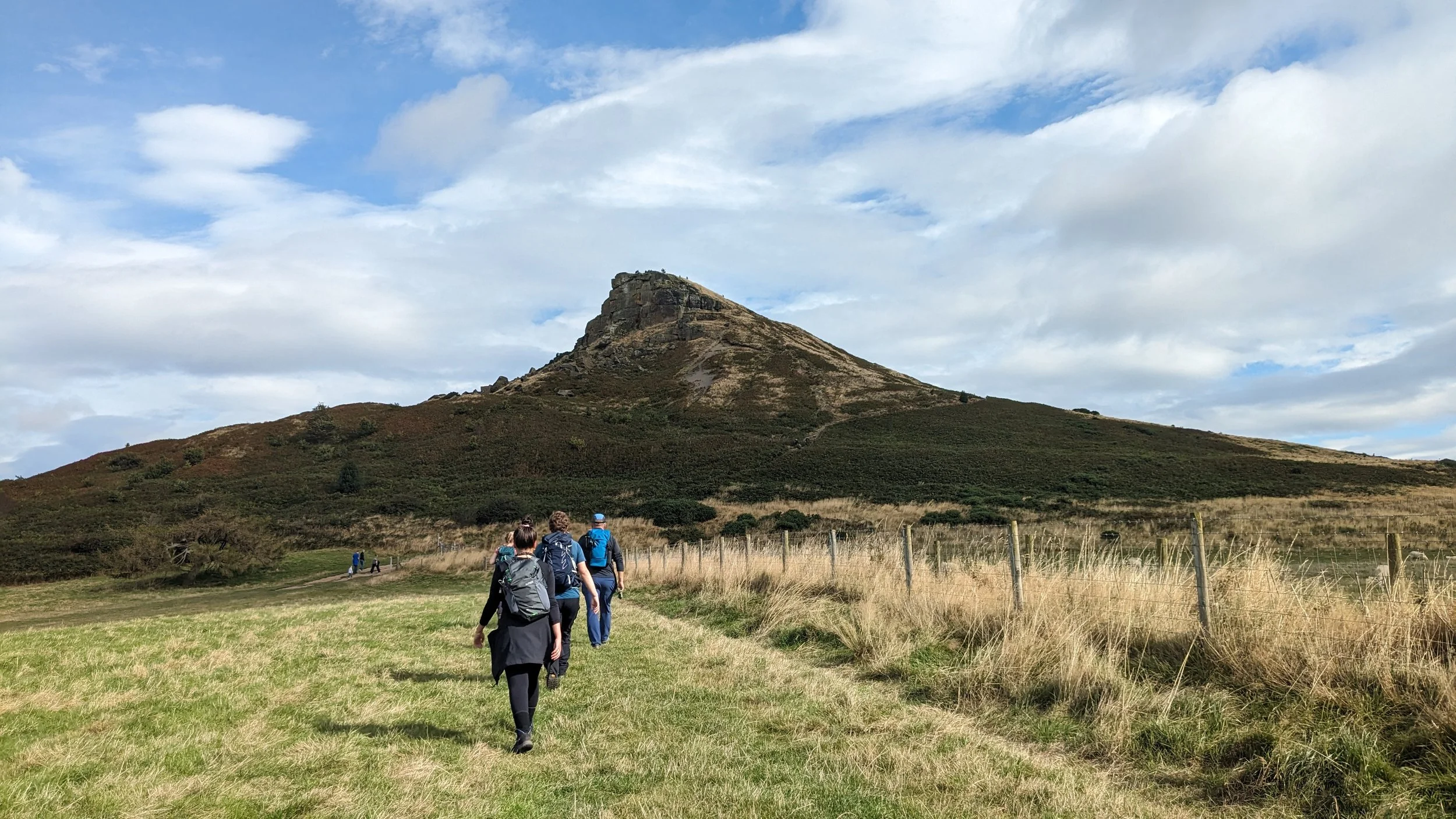 A group of women hiking towards Roseberry Topping