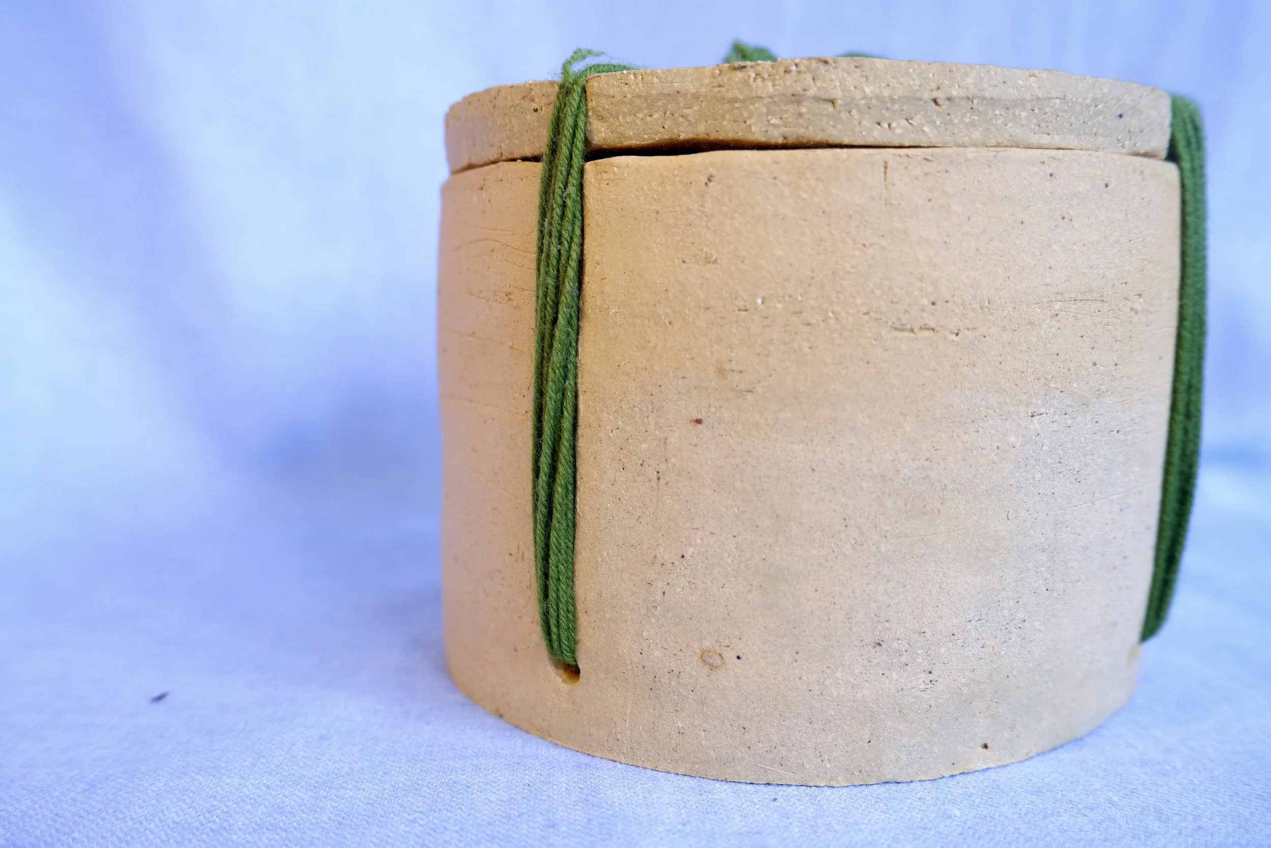 Keep a memory, a secret, a piece of something in here. Seal the jar with an intricate knot, and never open it again. With you forever.