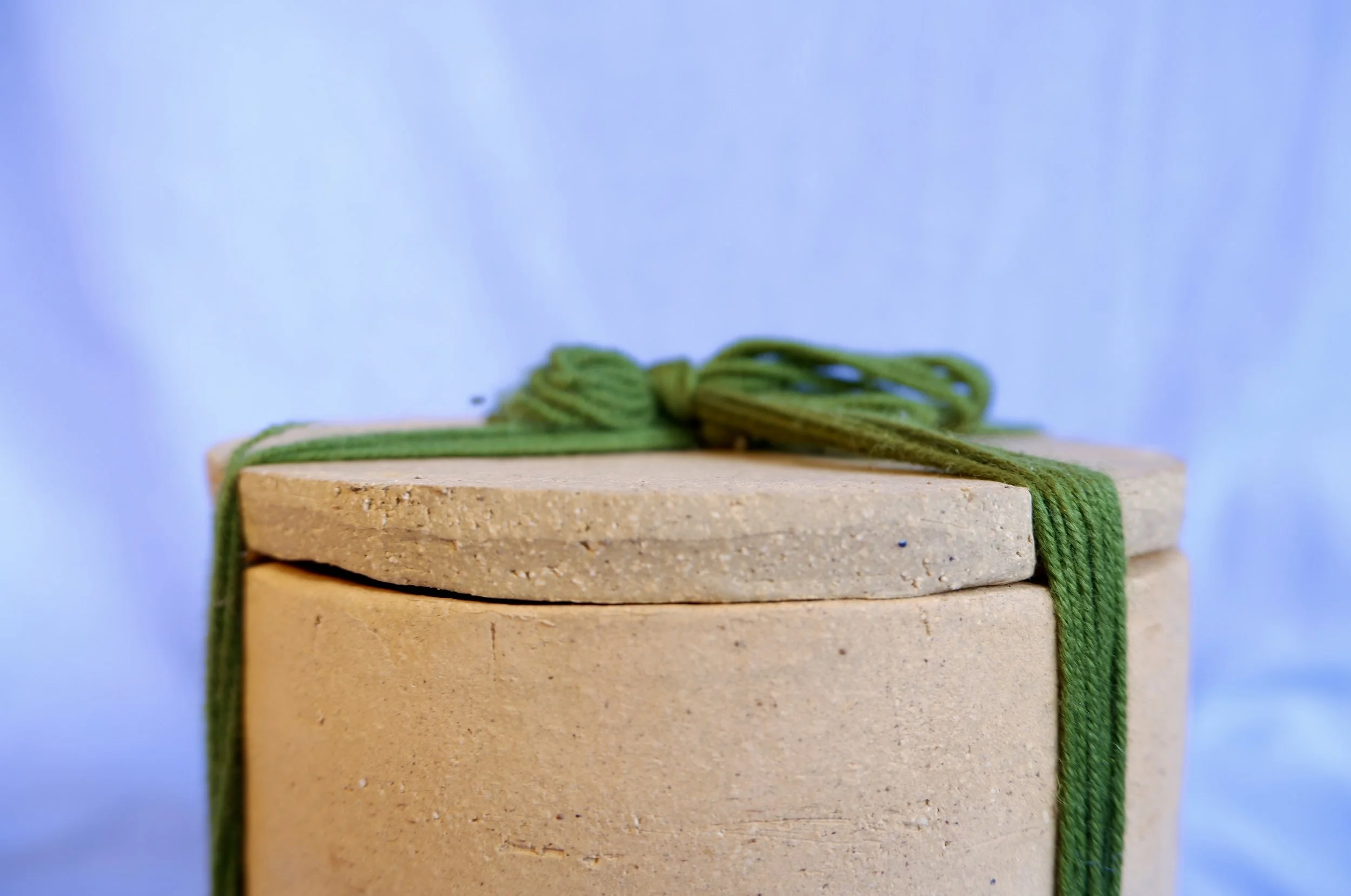 Keep a memory, a secret, a piece of something in here. Seal the jar with an intricate knot, and never open it again. With you forever.