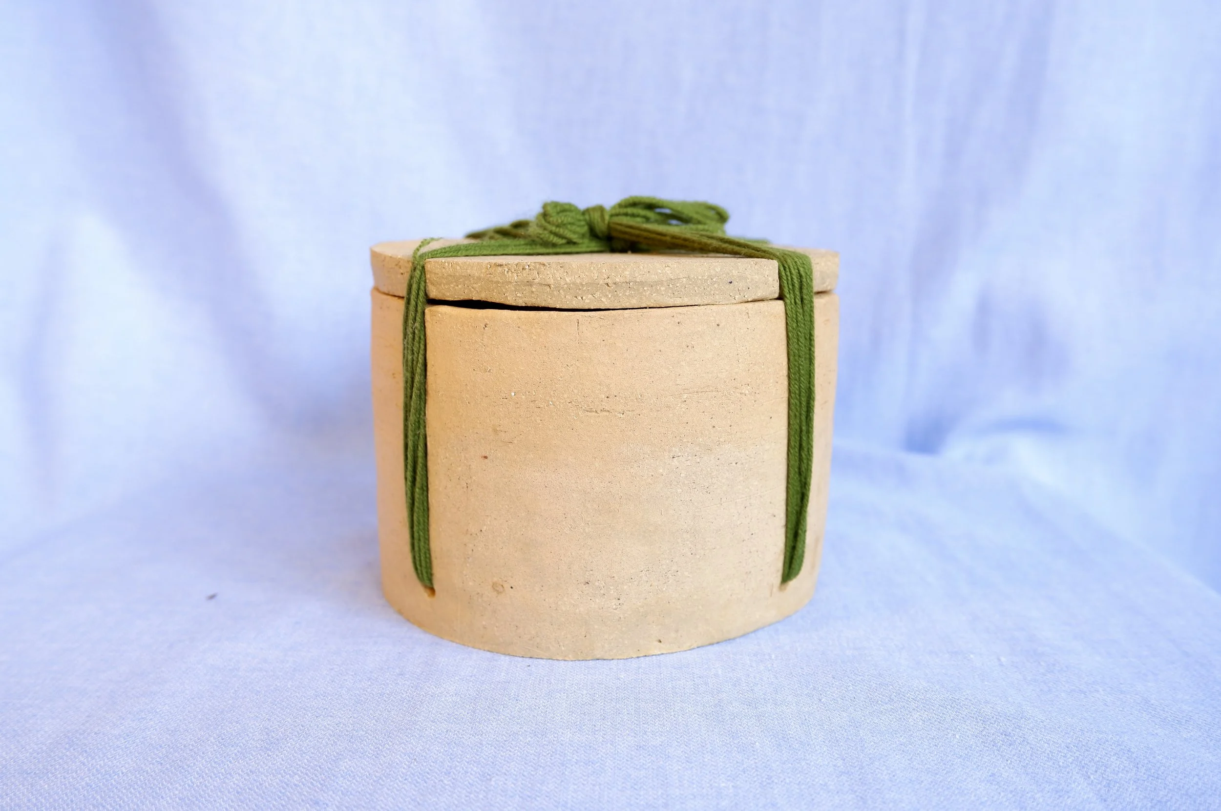 Keep a memory, a secret, a piece of something in here. Seal the jar with an intricate knot, and never open it again. With you forever.