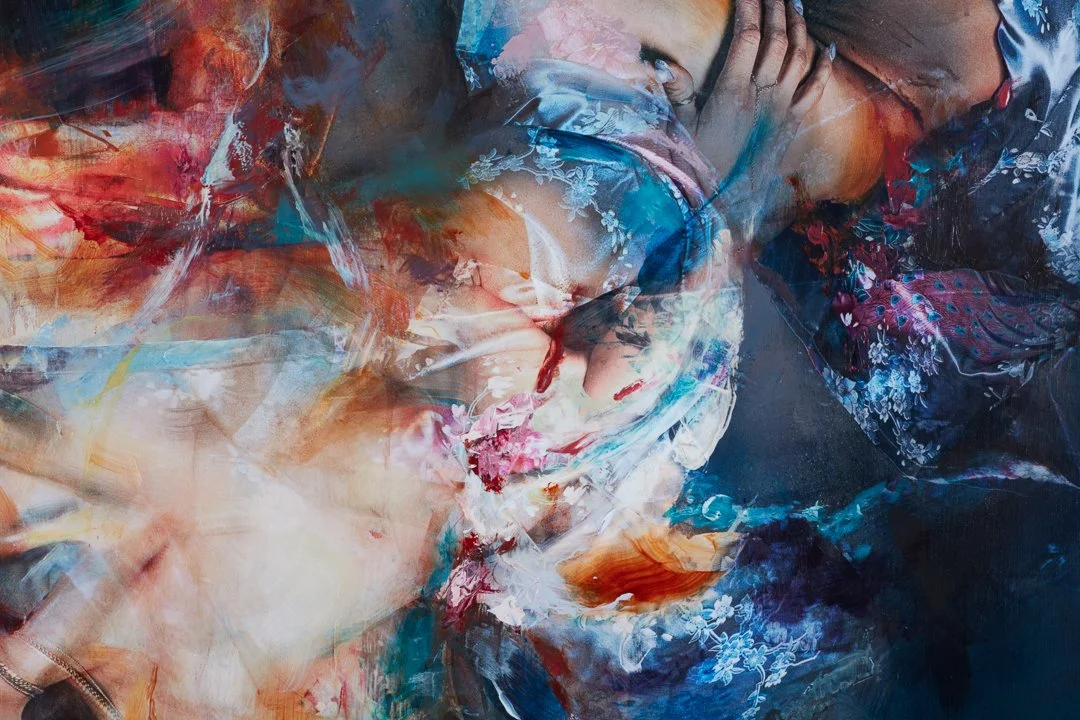 Abstract painting with vibrant colors and floral patterns, featuring a person's face partially visible among the brushstrokes.