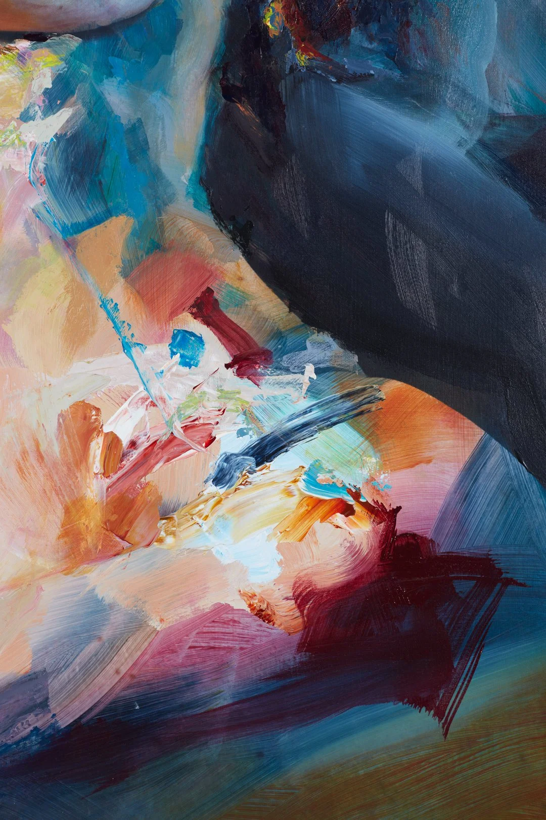 Close-up of an abstract painting with vibrant colors including blues, reds, oranges, and black, featuring bold, sweeping brushstrokes and textured layering.