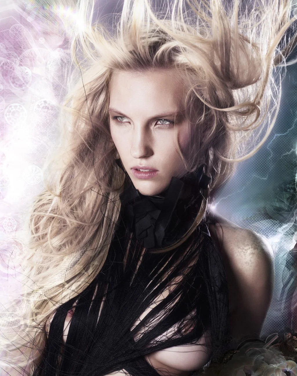 A woman with long blonde hair, intense look, in a dark outfit, with a colorful, abstract background.