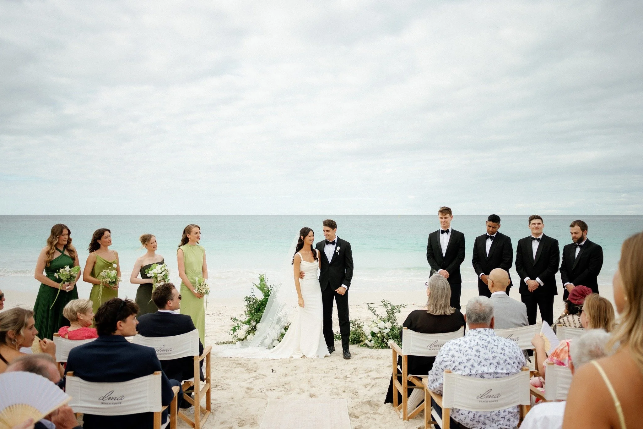 A beach ceremony looks effortless, but every detail is carefully designed to feel that way.

From wind-friendly item placement to aisle florals anchored for outdoor conditions, coastal weddings require planning that balances beauty with logistics. Sa