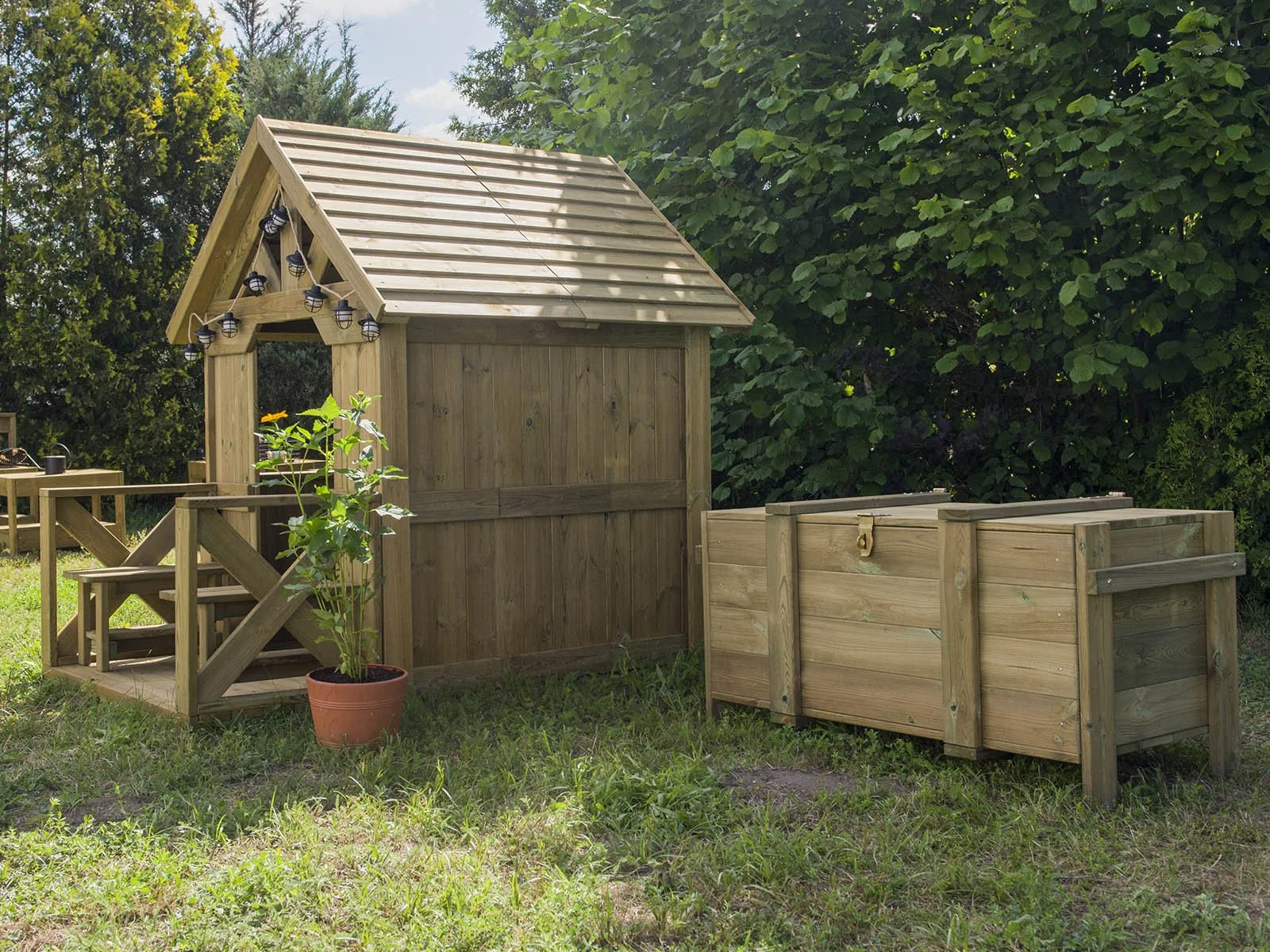 Natural wooden sensory garden storage box made of impregnated pine wood, designed for children aged 1–7 to support organized outdoor sensory play.