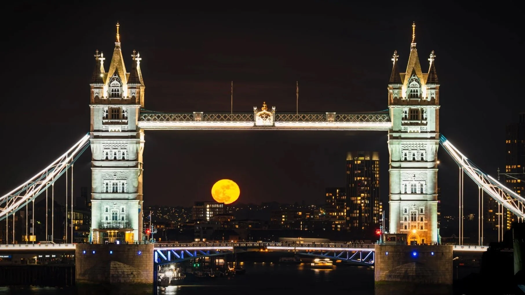 Tower Bridge with full moon rising over it