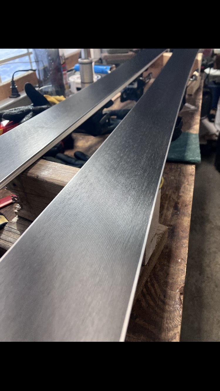 Oranssi technician working on a roof project