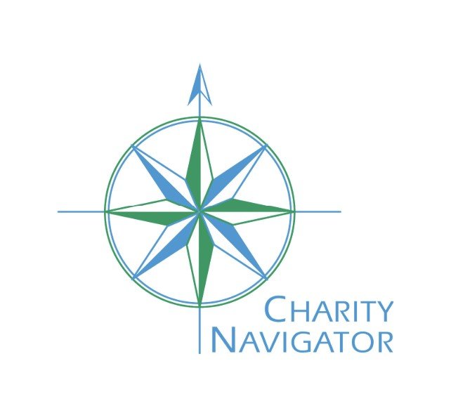 A logo featuring a compass rose with blue and green colors and the words 'Charity Navigator' underneath.