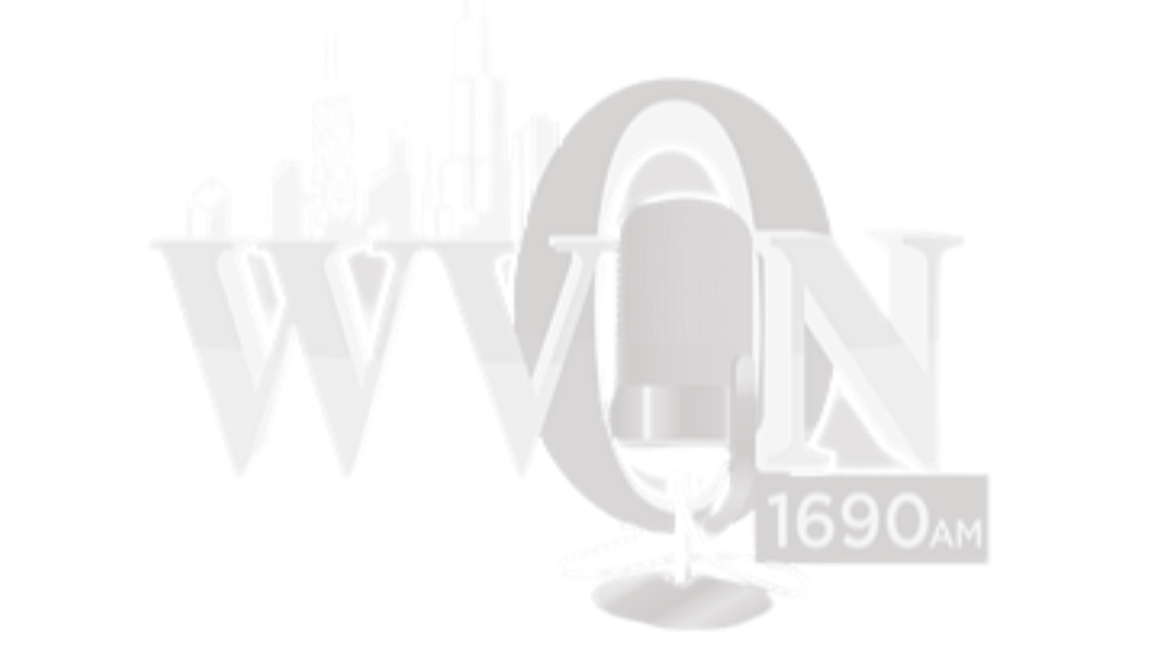 Radio station logo with city skyline, a microphone, and the text "WVOX 1690 AM"