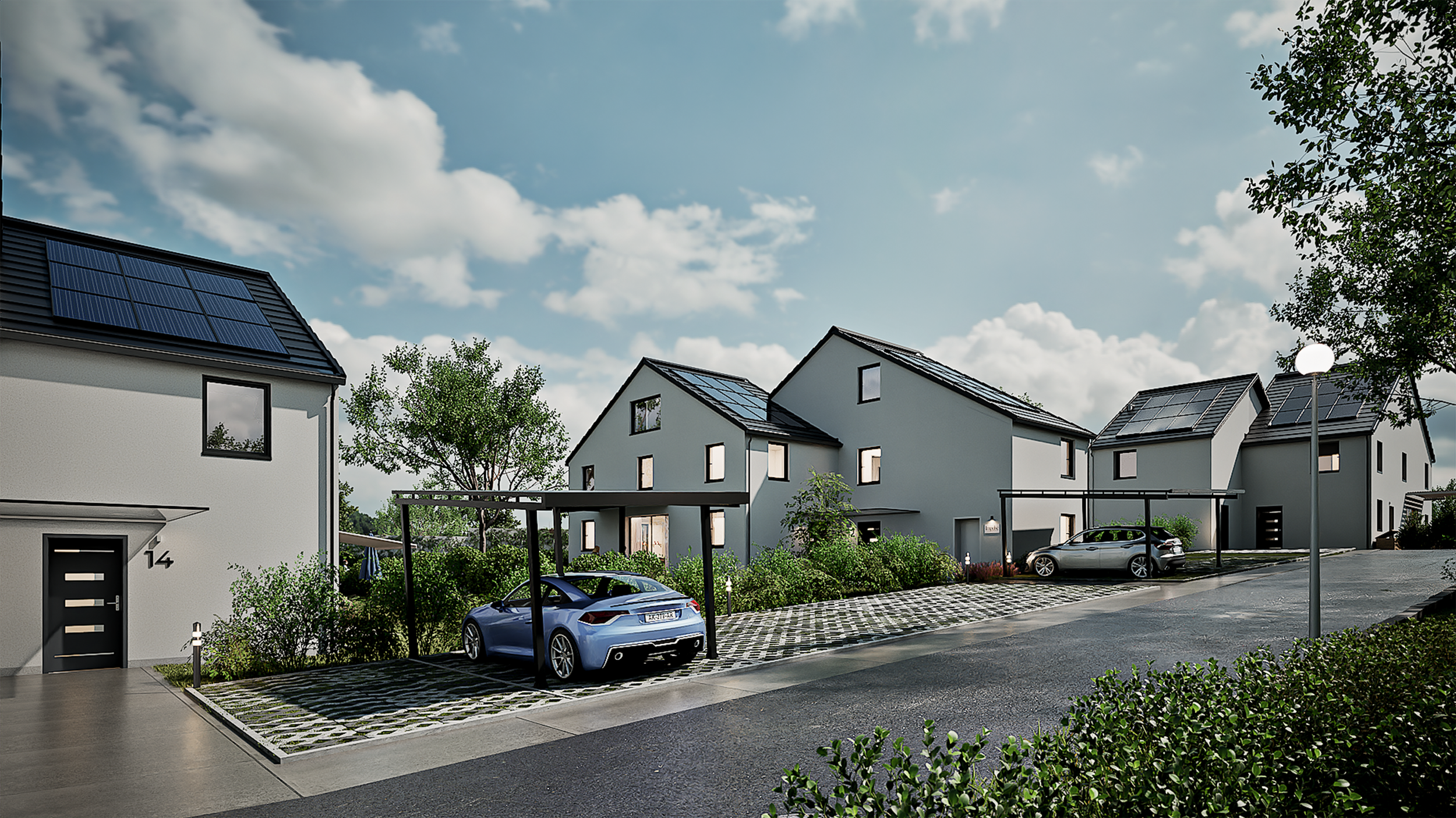 Modern residential neighborhood with white houses featuring solar panels on the roofs, parked cars in carports, trees, bushes, and a cloudy sky.