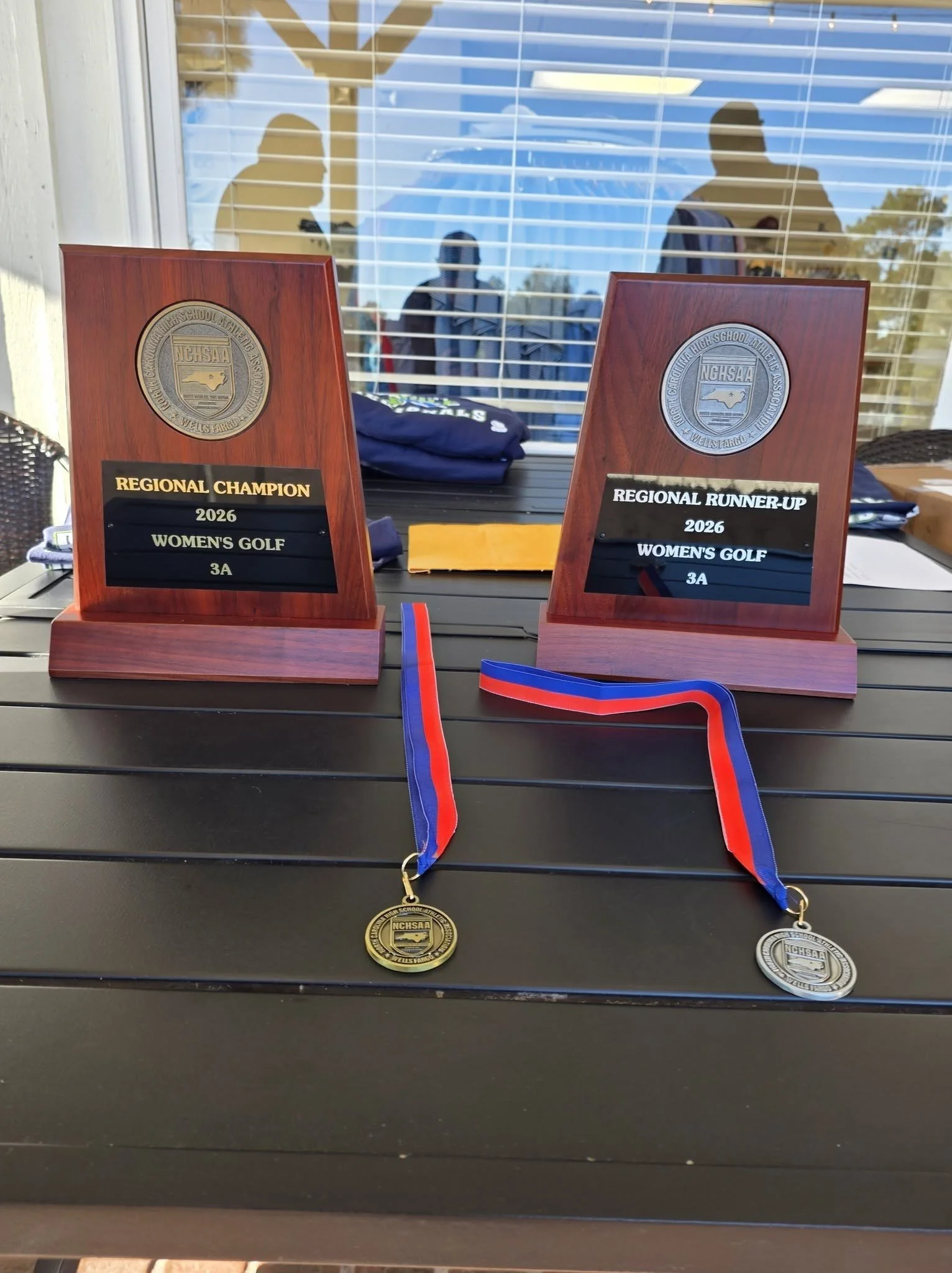 2026 NCHSAA 3A Women's Golf Regional Champion and Runner-Up plaques and medals