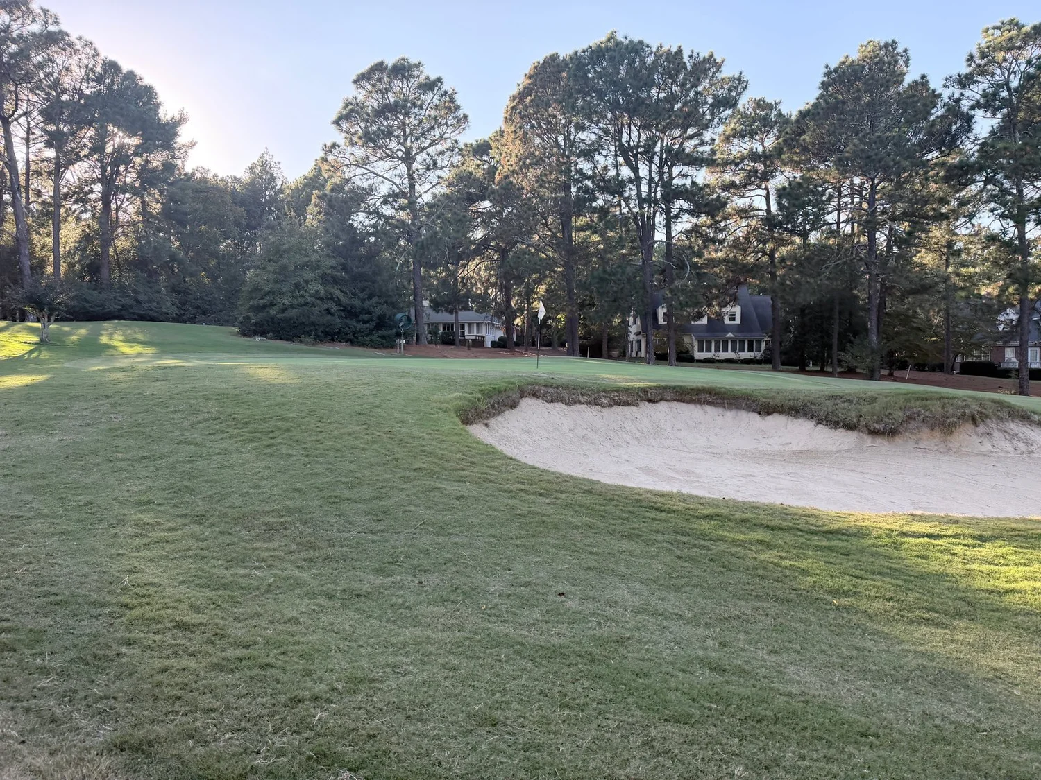Greenside bunker short of the hole 5 green