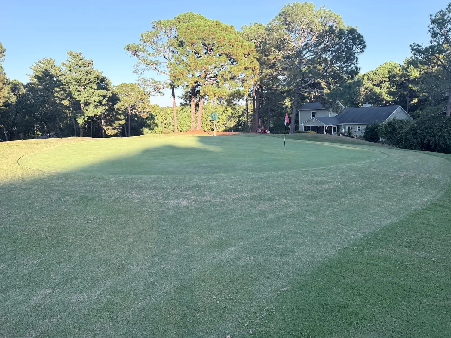 Hole 6 green with a red flag