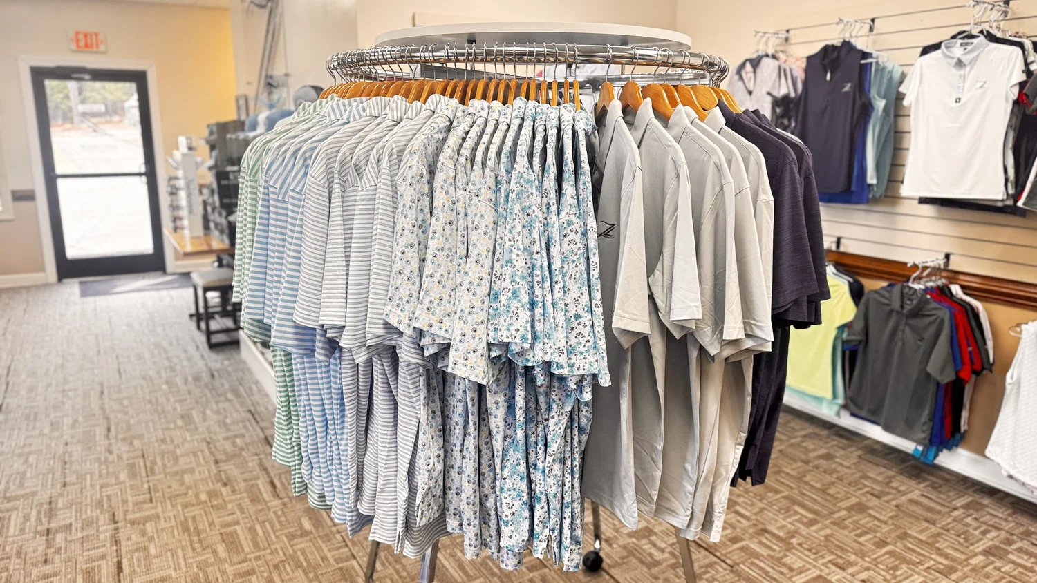 Polo shirts on a rack in the Pro Shop
