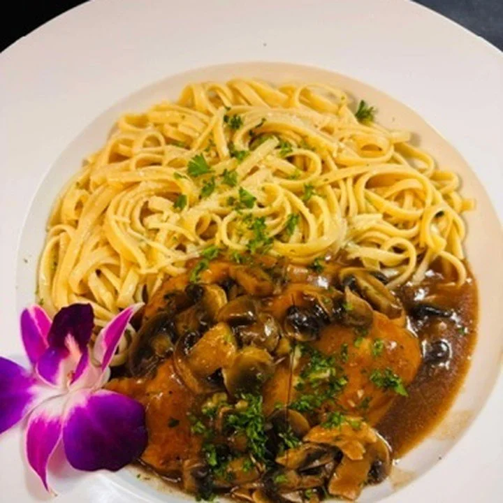 Chicken Marsala over linguine