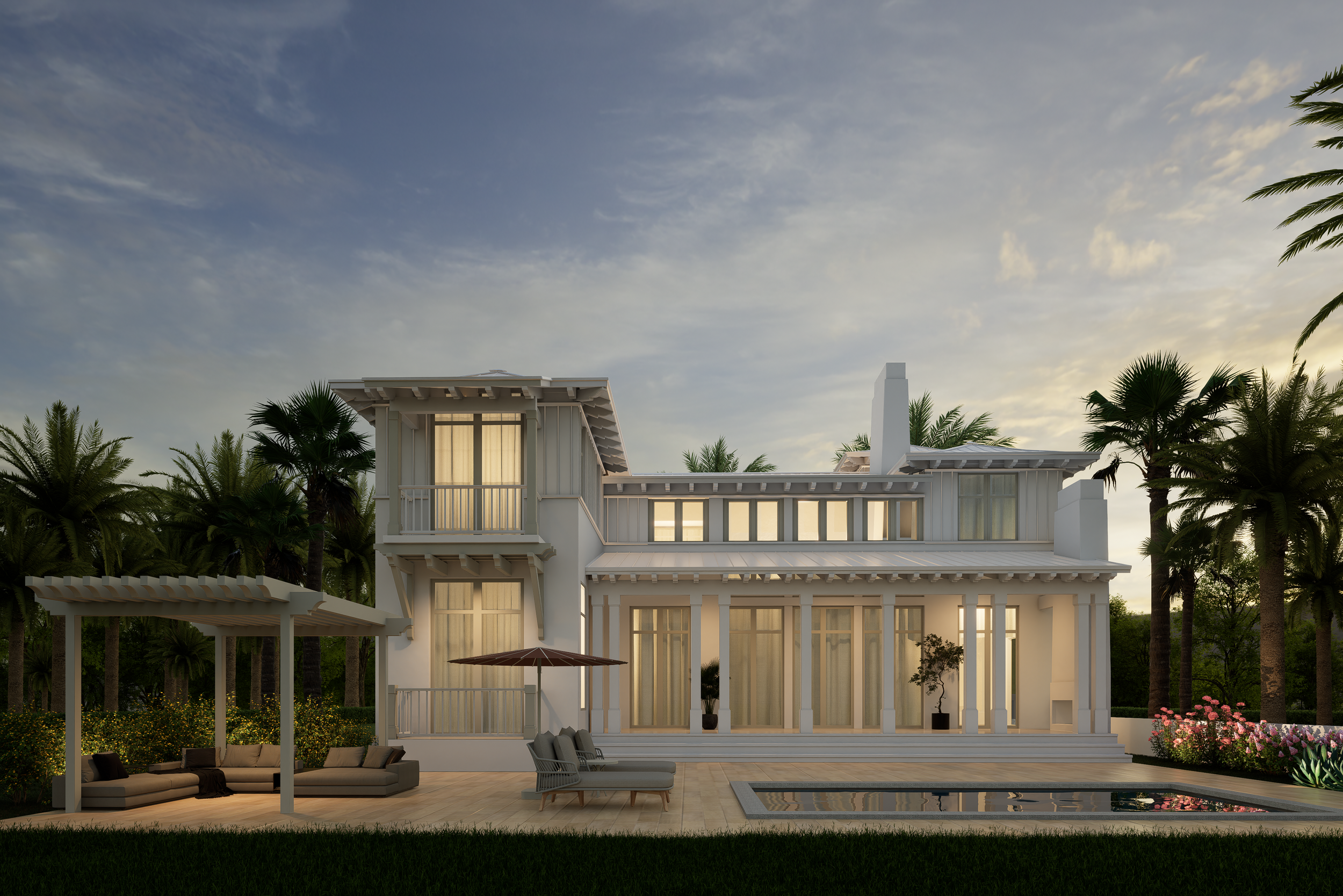 View of a modern white two-story house with large windows, a backyard patio with seating, a swimming pool, and surrounded by palm trees, during sunset.