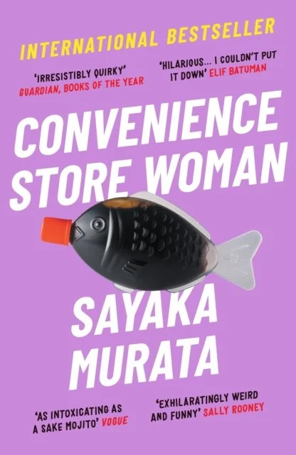 Purple book cover with a fish shaped soy sauce bottle and white, yellow, black and red text.