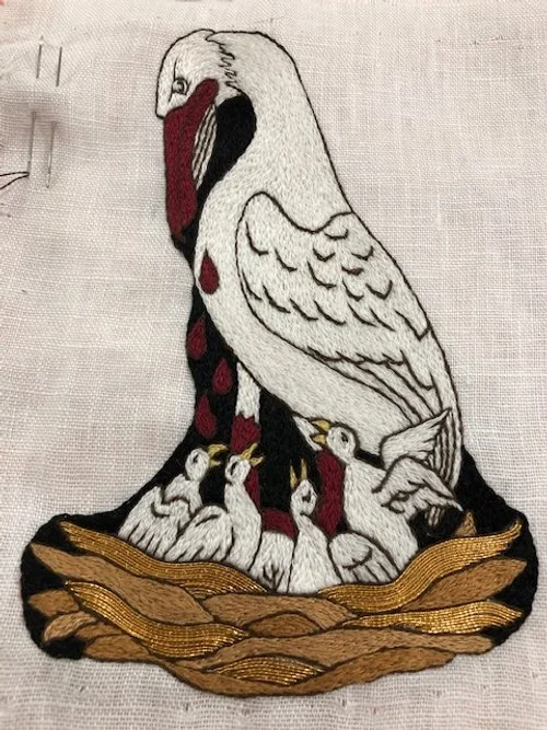 Opus Anglicanum Pelican badge embroidered in silk and gold, employing underside couching.