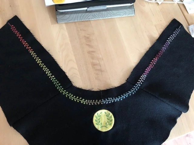 Commissioned Laurel badge with integrated collar embroidery. Silk embroidery worked to complement an existing garment.